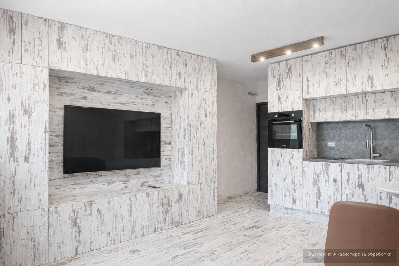 Modern one-room apartment in the city center area. image 1